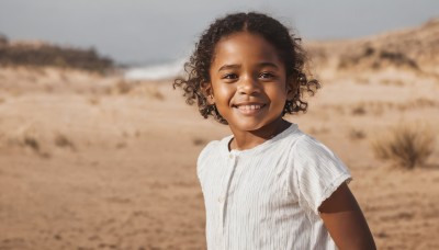 1girl,solo,looking at viewer,smile,short hair,shirt,black hair,1boy,brown eyes,white shirt,upper body,short sleeves,male focus,outdoors,teeth,day,striped,dark skin,grin,blurry,black eyes,dark-skinned female,blurry background,dark-skinned male,child,curly hair,striped shirt,realistic,male child,field,very dark skin,photo background,real life insert,afro,brown hair,parody,sand,desert