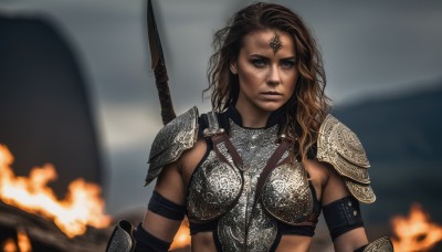 1girl,solo,long hair,breasts,looking at viewer,brown hair,brown eyes,upper body,weapon,sword,dark skin,armor,blurry,lips,grey eyes,blurry background,wavy hair,scar,facial mark,fire,polearm,shoulder armor,armband,pauldrons,breastplate,realistic,bikini armor,chainmail,outdoors,shield,serious