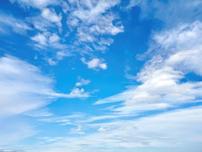 monochrome,outdoors,sky,day,cloud,water,blue sky,no humans,ocean,cloudy sky,scenery,blue theme,horizon,above clouds