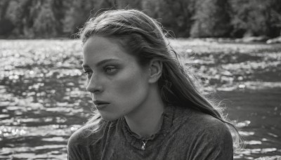 1girl,solo,long hair,jewelry,closed mouth,monochrome,upper body,greyscale,outdoors,necklace,mole,blurry,lips,looking to the side,depth of field,blurry background,looking away,portrait,freckles,realistic,nose,looking afar,water,expressionless