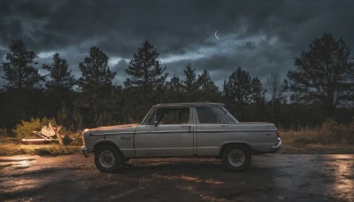 outdoors,sky,cloud,tree,no humans,night,moon,cloudy sky,grass,ground vehicle,nature,night sky,scenery,motor vehicle,forest,car,road,bush,crescent moon,vehicle focus,sports car,water,reflection