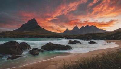 outdoors,sky,cloud,water,no humans,bird,ocean,beach,cloudy sky,grass,nature,scenery,sunset,rock,mountain,sand,horizon,river,landscape,mountainous horizon,shore,orange sky,red sky,waves,evening