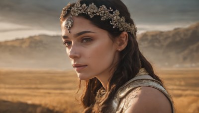 1girl,solo,long hair,looking at viewer,smile,brown hair,black hair,hair ornament,bare shoulders,brown eyes,jewelry,upper body,flower,outdoors,sky,sleeveless,cloud,mole,blurry,from side,lips,dutch angle,depth of field,blurry background,heterochromia,gem,portrait,freckles,circlet,mountain,realistic,nose,head wreath,field,closed mouth,yellow eyes