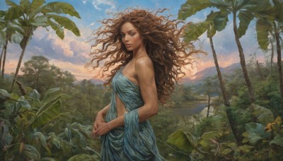 1girl,solo,long hair,breasts,looking at viewer,blue eyes,brown hair,dress,bare shoulders,brown eyes,flower,outdoors,sky,day,cloud,dark skin,from side,dark-skinned female,tree,lips,strapless,blue dress,leaf,wavy hair,own hands together,plant,messy hair,nature,scenery,forest,curly hair,realistic,nose,wind,freckles,sunset,palm tree,sun