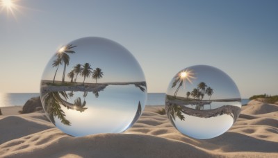 outdoors,sky,day,water,tree,blue sky,no humans,ocean,beach,scenery,reflection,sunset,rock,sand,palm tree,sun,horizon,shore,desert,simple background,realistic,still life,island