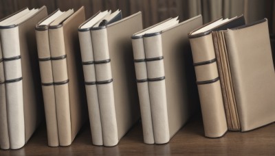 indoors,blurry,book,no humans,depth of field,blurry background,table,wooden floor,paper,scroll,still life,wooden table,wood,floating,open book,realistic,book stack,reflective floor