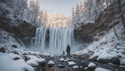 1boy, standing, outdoors, sky, day, water, tree, backpack, nature, scenery, snow, forest, rock, mountain, winter clothes, wide shot, winter, waterfall