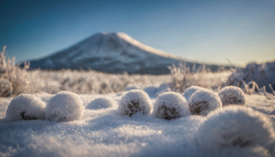 outdoors, sky, day, blurry, tree, blue sky, no humans, depth of field, scenery, snow, mountain, winter