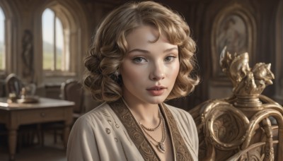 1girl,solo,looking at viewer,short hair,blonde hair,jewelry,upper body,earrings,parted lips,indoors,necklace,blurry,lips,grey eyes,window,depth of field,blurry background,chair,table,ring,portrait,freckles,curly hair,realistic,fantasy,pearl necklace,day,piercing,statue