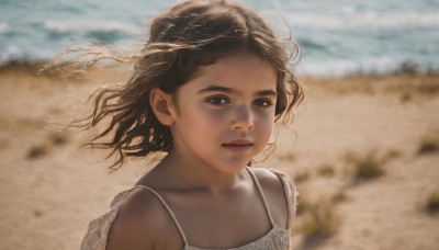 1girl,solo,looking at viewer,short hair,brown hair,black hair,dress,brown eyes,closed mouth,upper body,outdoors,day,dark skin,white dress,blurry,dark-skinned female,lips,floating hair,depth of field,blurry background,ocean,beach,wind,portrait,realistic,nose,sand,bare shoulders,collarbone,water,shore