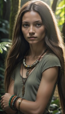 1girl,solo,long hair,looking at viewer,brown hair,shirt,brown eyes,jewelry,upper body,short sleeves,outdoors,dark skin,necklace,blurry,bracelet,dark-skinned female,lips,crossed arms,nature,freckles,realistic,nose,green shirt,breasts,collarbone,small breasts,parted lips,artist name,eyelashes,blurry background,plant,pendant,forest,facepaint,dirty,tribal