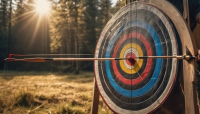 weapon,outdoors,day,blurry,tree,no humans,depth of field,sunlight,grass,nature,scenery,forest,light rays,sun,field,blurry background,science fiction