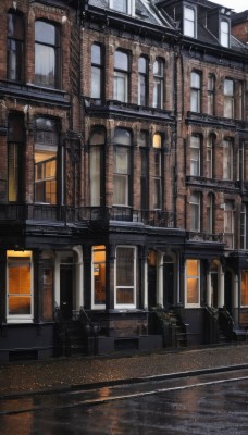 outdoors,day,no humans,window,sunlight,plant,building,scenery,stairs,door,potted plant,road,architecture,street,arch,pavement,sky,water,reflection,city