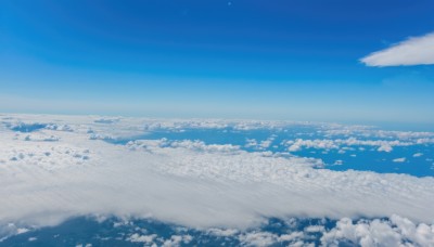 monochrome,outdoors,sky,day,cloud,blue sky,no humans,ocean,cloudy sky,nature,scenery,blue theme,horizon,landscape,above clouds