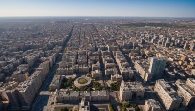 outdoors,sky,day,water,tree,blue sky,no humans,ocean,from above,building,scenery,city,horizon,cityscape,river,skyscraper,landscape,real world location,cloud