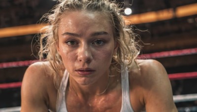 1girl,solo,looking at viewer,blonde hair,brown hair,bare shoulders,brown eyes,collarbone,upper body,sweat,parted lips,dark skin,medium hair,blurry,dark-skinned female,lips,blurry background,tank top,messy hair,freckles,realistic,nose,white tank top,short hair,green eyes,portrait