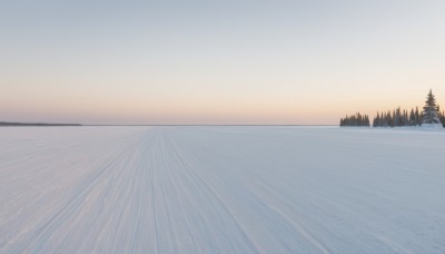 outdoors,sky,water,tree,blue sky,no humans,ocean,nature,scenery,snow,forest,sunset,mountain,horizon,winter,landscape,sunrise,pine tree,cloud,sun,bare tree,lake,gradient sky