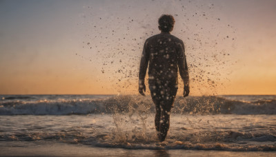 solo, black hair, 1boy, male focus, outdoors, sky, from behind, ocean, beach, walking, sunset, sand, footprints