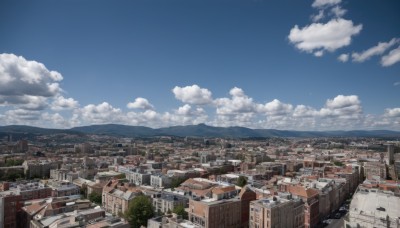 outdoors,sky,day,cloud,tree,blue sky,no humans,window,ocean,cloudy sky,building,scenery,mountain,city,horizon,road,cityscape,house,landscape,rooftop,town,nature,forest