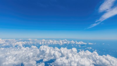 monochrome,outdoors,sky,day,cloud,blue sky,dutch angle,no humans,bird,ocean,cloudy sky,scenery,blue theme,horizon,landscape,above clouds,water