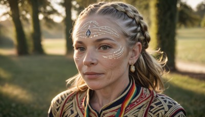 1girl,solo,long hair,looking at viewer,smile,brown hair,jewelry,closed mouth,upper body,braid,grey hair,earrings,outdoors,day,blurry,black eyes,lips,grey eyes,depth of field,blurry background,facial mark,gem,portrait,french braid,freckles,circlet,realistic,nose,hair pulled back