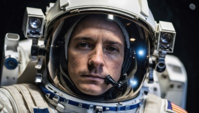 solo,looking at viewer,1boy,brown eyes,closed mouth,male focus,blurry,depth of field,facial hair,helmet,portrait,headset,reflection,science fiction,realistic,space,planet,spacesuit,space helmet,astronaut,earth (planet),american flag,spacecraft