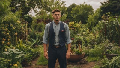 solo,looking at viewer,smile,short hair,brown hair,shirt,black hair,1boy,standing,white shirt,flower,male focus,outdoors,day,collared shirt,belt,pants,vest,tree,facial hair,black pants,plant,nature,scenery,beard,sleeves rolled up,realistic,bush,garden,closed mouth,sky,grass,forest,brown belt,watercraft,blue vest,undercut