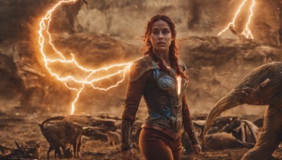 1girl,solo,long hair,breasts,blue eyes,brown hair,long sleeves,closed mouth,standing,red hair,cowboy shot,outdoors,solo focus,pants,armor,lips,glowing,animal,fire,clenched hands,rock,realistic,arms at sides,electricity,brown pants,lightning,molten rock,looking at viewer,shirt,jewelry,weapon,braid,parted lips,teeth,orange hair,shoulder armor,freckles,monster,fantasy