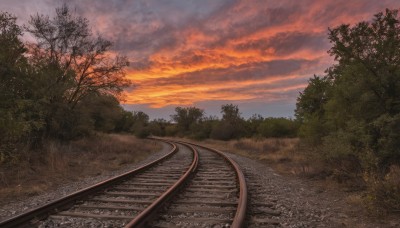 outdoors,sky,cloud,tree,no humans,cloudy sky,grass,nature,scenery,forest,sunset,road,bush,bridge,evening,orange sky,red sky,railroad tracks,field,landscape,path