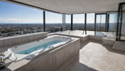 outdoors,sky,day,cloud,indoors,water,blue sky,no humans,window,shadow,table,plant,building,scenery,city,cityscape,skyscraper,skyline,ocean,watercraft