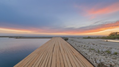 outdoors,sky,cloud,water,tree,blue sky,no humans,ocean,cloudy sky,grass,scenery,sunset,horizon,road,bridge,river,evening,landscape,gradient sky,shore,plant,rock,bush,watercraft,wall,ship,boat,path,pier