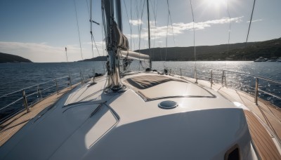 outdoors,sky,day,cloud,water,blue sky,no humans,ocean,sunlight,ground vehicle,scenery,motor vehicle,railing,sun,horizon,car,road,watercraft,vehicle focus,power lines,lamppost,utility pole,boat,shadow,beach,cloudy sky,light rays,sand,ship,waves,shore,dock