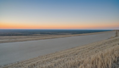 outdoors,sky,day,cloud,water,tree,blue sky,no humans,ocean,beach,grass,nature,scenery,sunset,sand,horizon,field,landscape,gradient sky,shore,sun