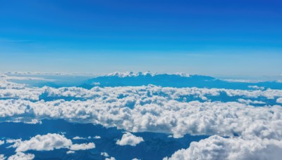 monochrome,outdoors,sky,day,cloud,blue sky,no humans,ocean,cloudy sky,nature,scenery,blue theme,mountain,horizon,landscape,above clouds,water