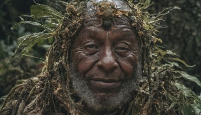 solo,looking at viewer,smile,1boy,closed mouth,grey hair,male focus,outdoors,blurry,black eyes,depth of field,blurry background,facial hair,leaf,plant,portrait,nature,beard,realistic,old,old man,crown