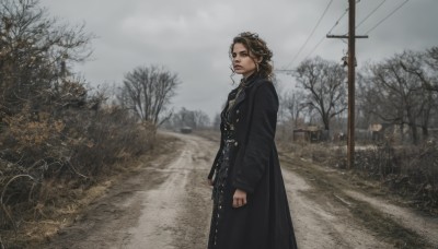 1girl,solo,long hair,looking at viewer,brown hair,long sleeves,jewelry,closed mouth,standing,outdoors,sky,cloud,necklace,black dress,from side,tree,coat,buttons,cloudy sky,scenery,black coat,realistic,road,power lines,bare tree,utility pole,photo background,fog,grey sky,dress,brown eyes,day,ring,street,overcast