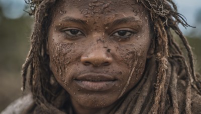 solo,looking at viewer,brown hair,1boy,brown eyes,braid,male focus,outdoors,parted lips,teeth,dark skin,blurry,black eyes,depth of field,blurry background,portrait,close-up,realistic,dirty,dirty face,dreadlocks,smile,black hair,facial hair,beard,freckles