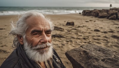 solo,1boy,closed mouth,jacket,upper body,white hair,male focus,outdoors,day,blurry,black jacket,blurry background,facial hair,ocean,scar,beach,thick eyebrows,portrait,beard,rock,mature male,realistic,mustache,sand,bald,manly,old,old man,desert,wrinkled skin,looking at viewer,smile,grey hair,water,grin,black eyes,depth of field,wind,scar on face,scar across eye,shore,debris