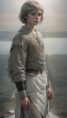 1girl,solo,looking at viewer,short hair,bangs,brown hair,shirt,long sleeves,brown eyes,closed mouth,standing,cowboy shot,outdoors,sky,day,belt,water,lips,wet,grey eyes,ocean,beach,sunlight,wet clothes,wading,realistic,nose,sand,arms at sides,shore,tunic,breasts,blonde hair,parted lips