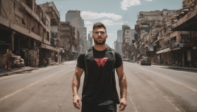 solo,looking at viewer,short hair,brown hair,shirt,black hair,1boy,standing,short sleeves,male focus,outdoors,sky,day,pants,cloud,bag,black shirt,facial hair,scar,black pants,backpack,ground vehicle,t-shirt,building,motor vehicle,beard,city,realistic,arms at sides,car,road,street,photo background,closed mouth,blue sky,muscular,muscular male,stubble,print shirt,real world location