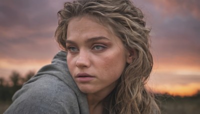 1girl,solo,long hair,blue eyes,blonde hair,brown hair,closed mouth,outdoors,sky,cloud,blurry,lips,looking to the side,grey eyes,depth of field,blurry background,looking away,portrait,freckles,realistic,nose,looking afar,tree,expressionless,cloudy sky,sunset