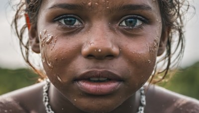 1girl,solo,looking at viewer,blue eyes,blonde hair,brown hair,jewelry,outdoors,parted lips,teeth,dark skin,necklace,blurry,dark-skinned female,lips,wet,depth of field,blurry background,piercing,portrait,close-up,freckles,realistic,dirty,black hair,eyelashes,chain,nose