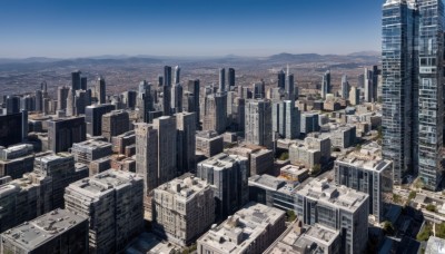 outdoors,sky,day,cloud,water,tree,blue sky,no humans,ocean,from above,building,scenery,mountain,city,horizon,cityscape,river,skyscraper,landscape,real world location,skyline