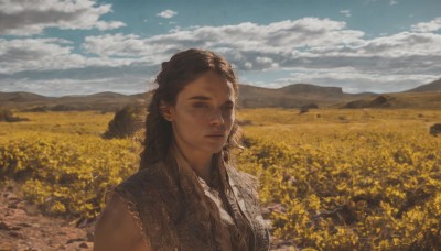 1girl,solo,long hair,looking at viewer,blue eyes,brown hair,black hair,upper body,flower,outdoors,sky,sleeveless,day,cloud,dark skin,blue sky,lips,cloudy sky,scenery,freckles,mountain,realistic,yellow flower,field,flower field,mole,sunlight,landscape,mole on cheek