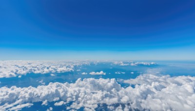 monochrome,outdoors,sky,day,cloud,blue sky,dutch angle,no humans,ocean,cloudy sky,scenery,blue theme,city,horizon,cityscape,landscape,above clouds