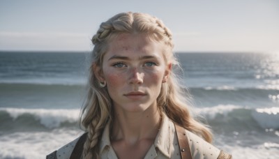 1girl,solo,long hair,looking at viewer,blue eyes,blonde hair,shirt,jewelry,closed mouth,white shirt,braid,earrings,outdoors,day,collared shirt,water,blurry,lips,depth of field,blurry background,ocean,beach,portrait,freckles,realistic,nose,dirty,smile,bangs,upper body,sky,sunlight,backlighting,horizon,waves,dirty face