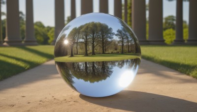 outdoors,sky,day,blurry,tree,blue sky,no humans,depth of field,blurry background,shadow,sunlight,grass,nature,scenery,lens flare,forest,reflection,road,bush,path,cloud,ball,mirror,still life