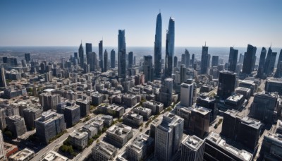 outdoors,sky,day,water,blue sky,no humans,ocean,building,scenery,city,horizon,cityscape,skyscraper,skyline,tree,road,rooftop,real world location