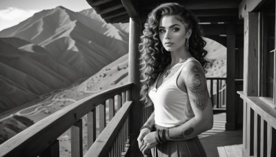 1girl,solo,long hair,breasts,looking at viewer,skirt,bare shoulders,jewelry,medium breasts,standing,monochrome,greyscale,cowboy shot,pleated skirt,earrings,outdoors,parted lips,sleeveless,dark skin,necklace,bracelet,dark-skinned female,lips,eyelashes,tattoo,wavy hair,ring,own hands together,tank top,curly hair,hoop earrings,mountain,nose,railing,bangle,arm tattoo,shoulder tattoo,signature,piercing,scenery,pendant,realistic