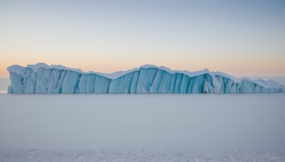 outdoors,sky,water,blue sky,no humans,ocean,nature,scenery,snow,mountain,horizon,river,landscape,mountainous horizon,lake,gradient sky,shore,sunrise,monochrome,cloud,bird,sunset,blue theme,sun